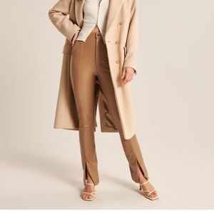 VEGAN LEATHER SPLIT HEM PANTS